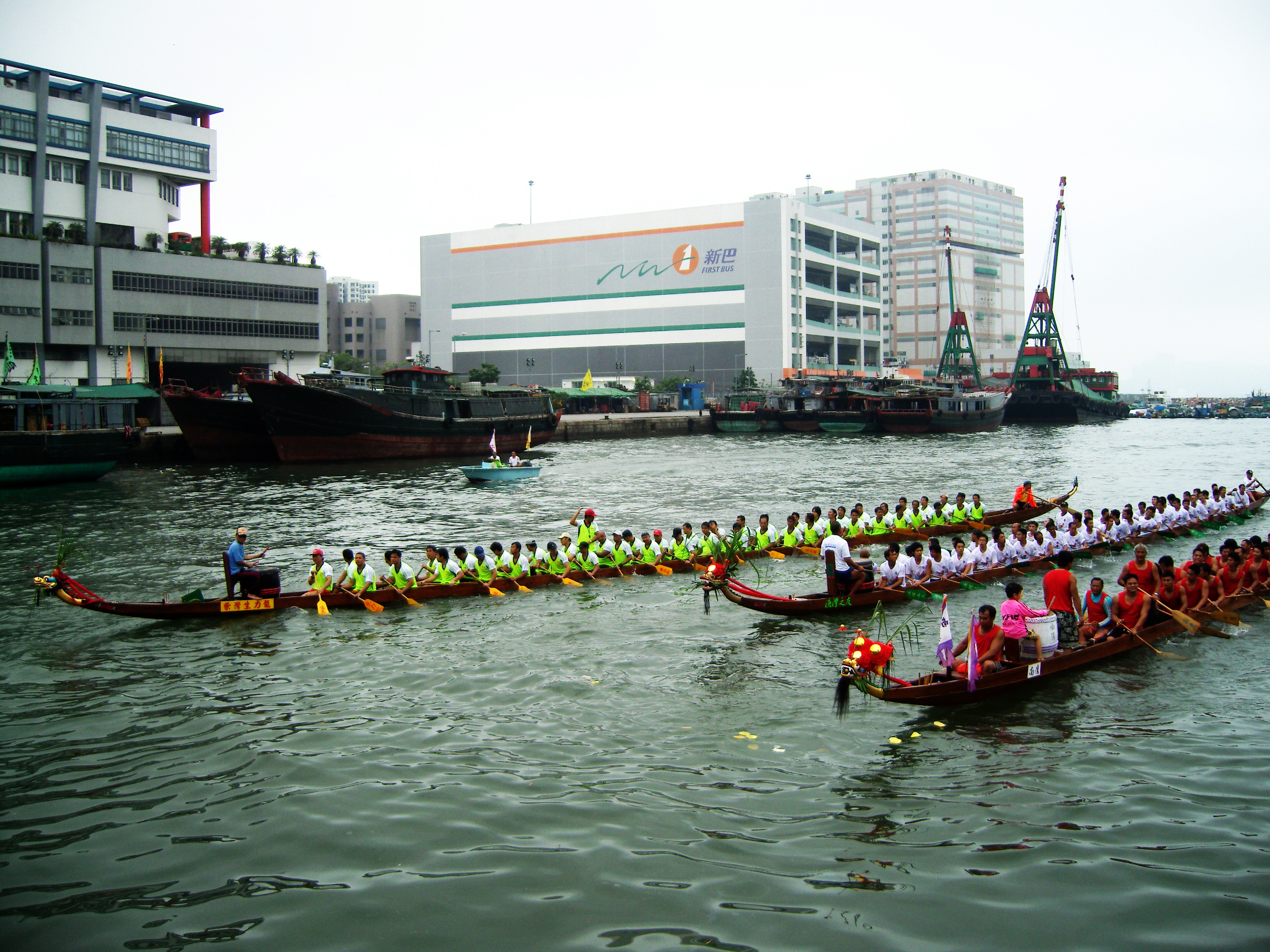 Dragon boat race with paddlers on the water