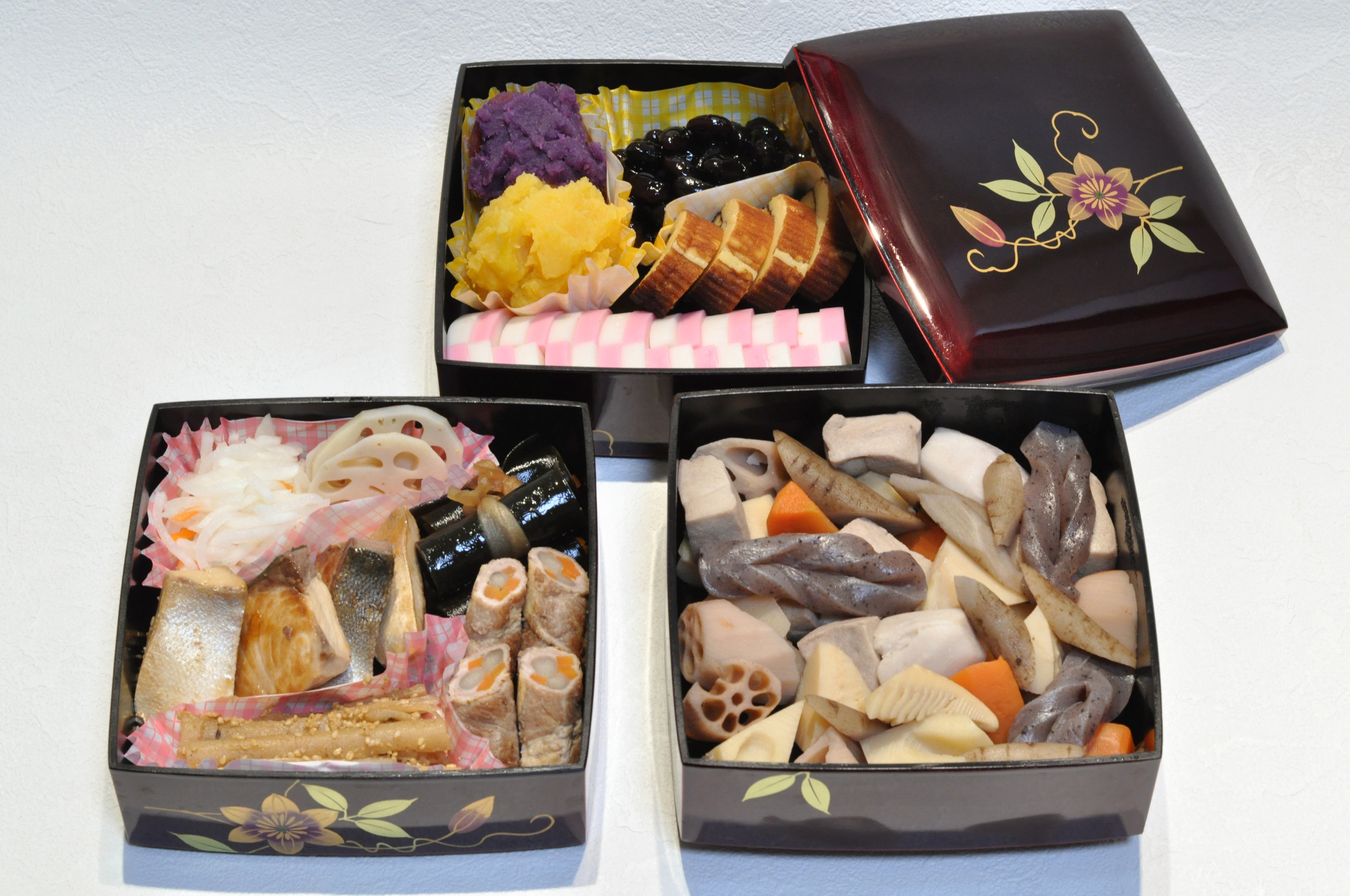 Osechi ryori dishes served in lacquered boxes for Japanese New Year